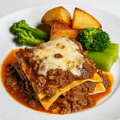 Beef Lasagne with Roast Potatoes and Seasonal Veg